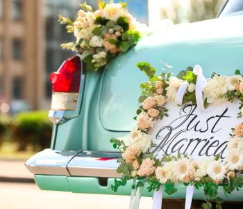 just married on classic wedding car