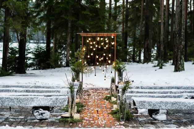 an outside ceremony at a winter wedding