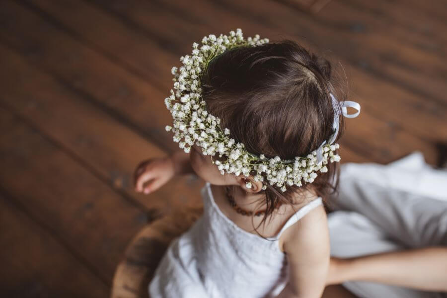 flower girl in white corron dress
